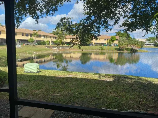 a view of a lake with a beach