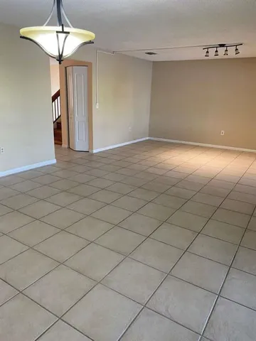 a view of a livingroom with chandelier