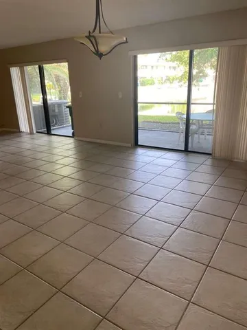 an empty room and window