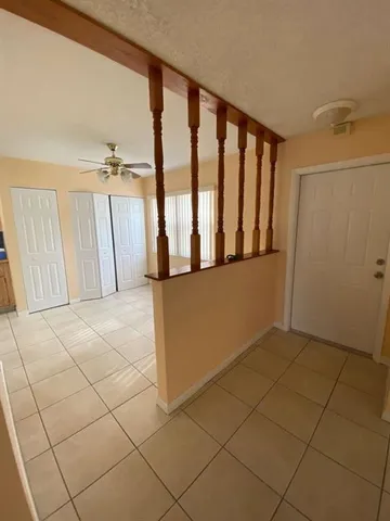 a view of a utility room with windows