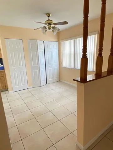 a view of a livingroom with an empty space and window