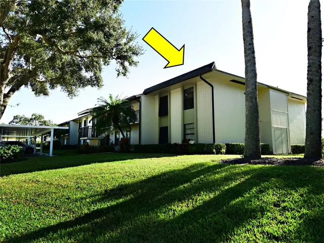 a view of a back yard of the house