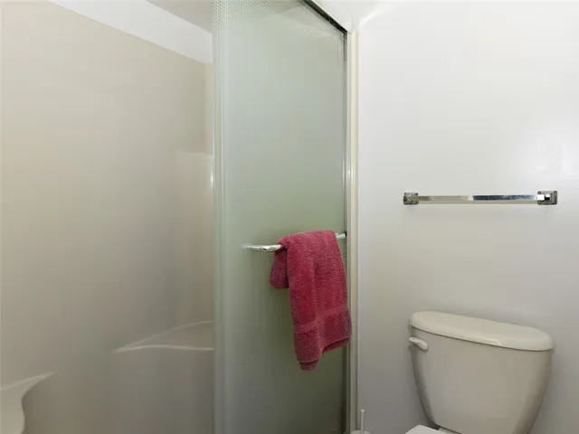 a bathroom with a shower curtain