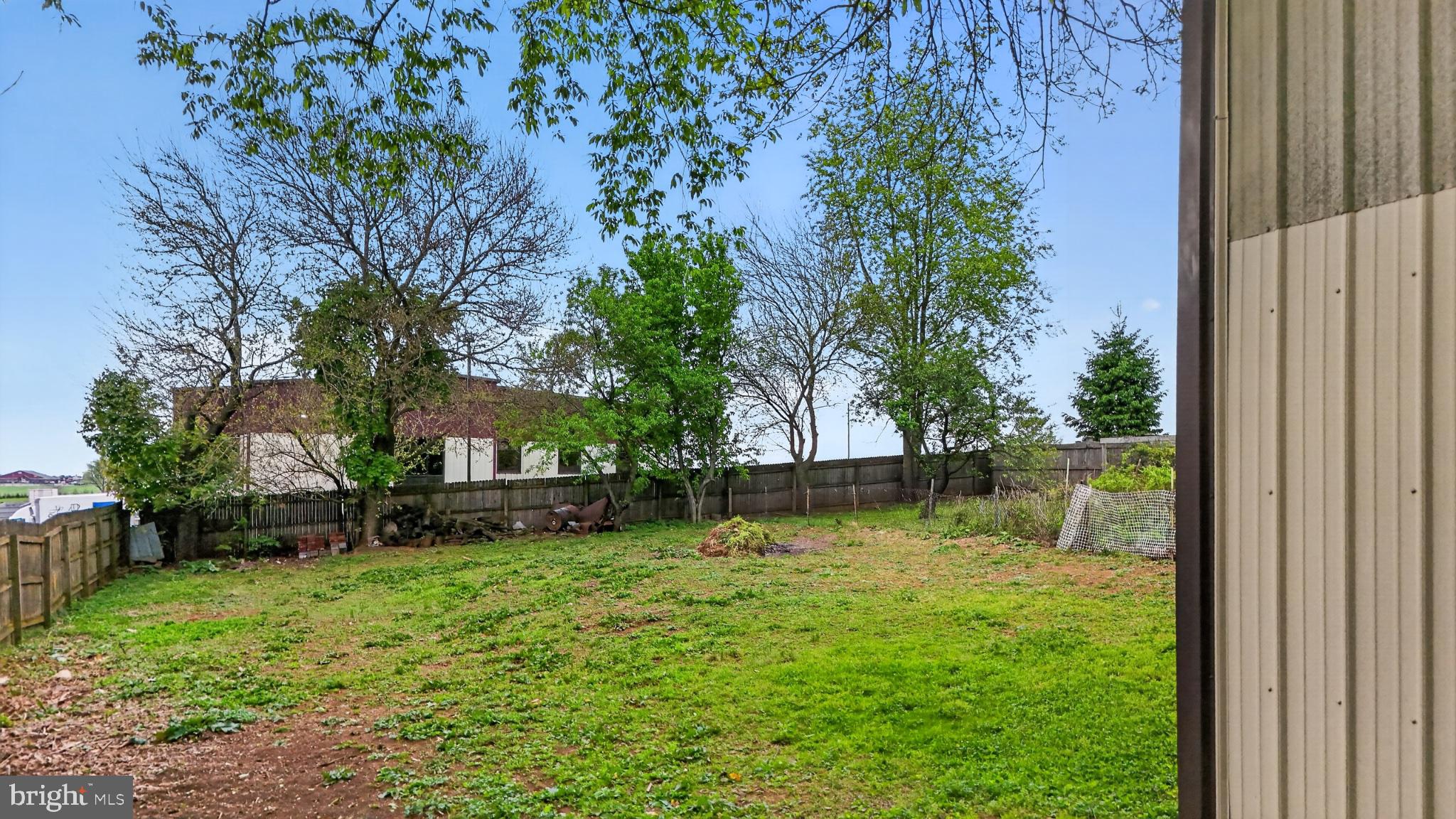 40 Queen Road Intercourse, PA 17529 - Photo 16 of 58 a view of a backyard with a garden
