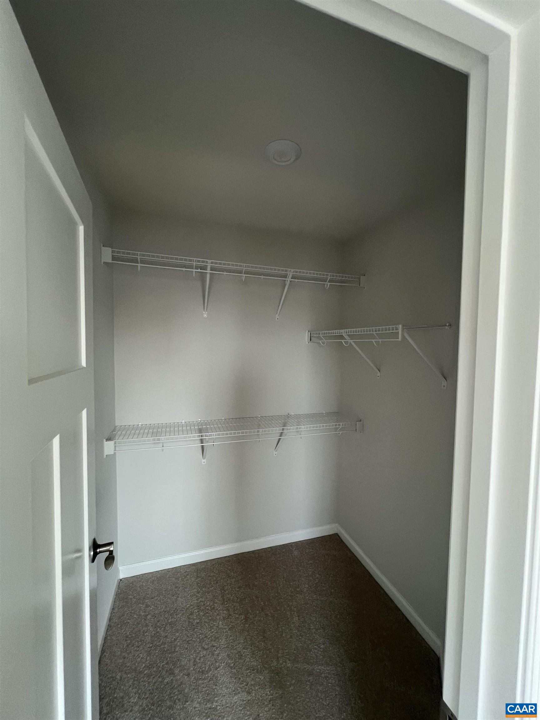 4440 Alston Street Crozet, VA 22932 - Photo 15 of 25 a view of a room with shelf on the wall