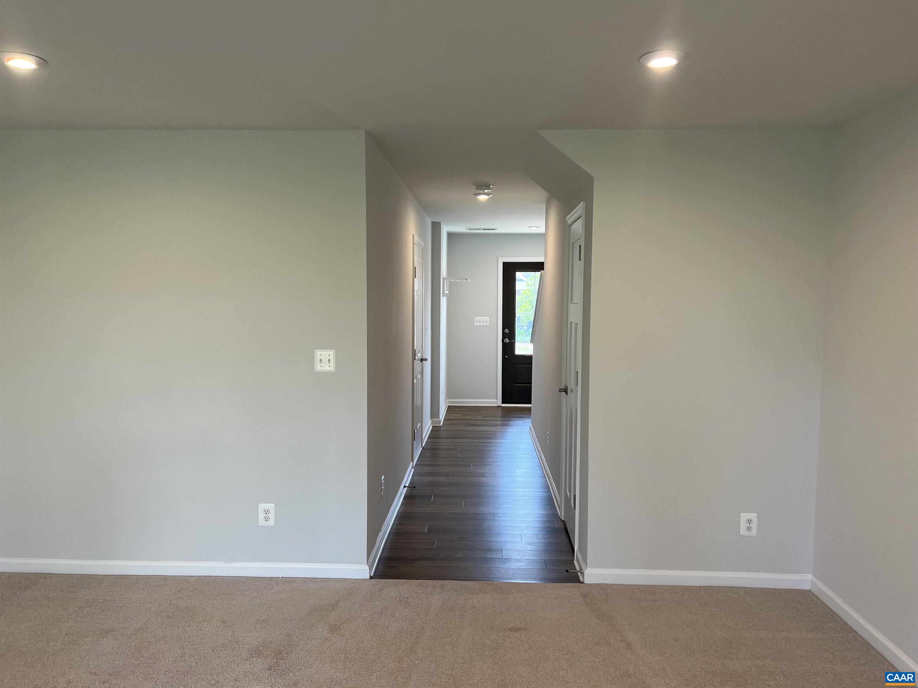 4440 Alston Street Crozet, VA 22932 - Photo 7 of 25 a view of a hallway with wooden floor