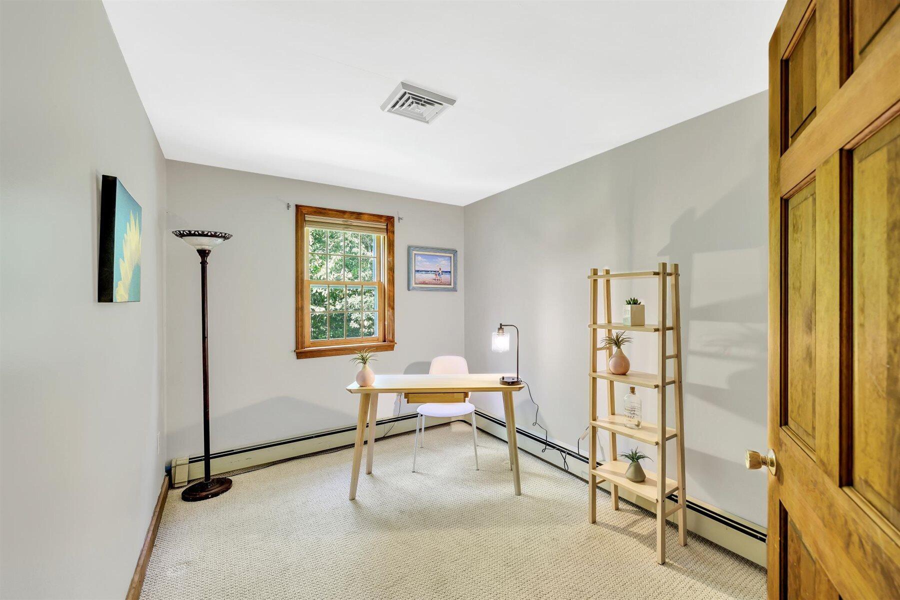 159 Old Chatham Road Brewster, MA 02631 - Photo 17 of 32 a workspace with table and a window