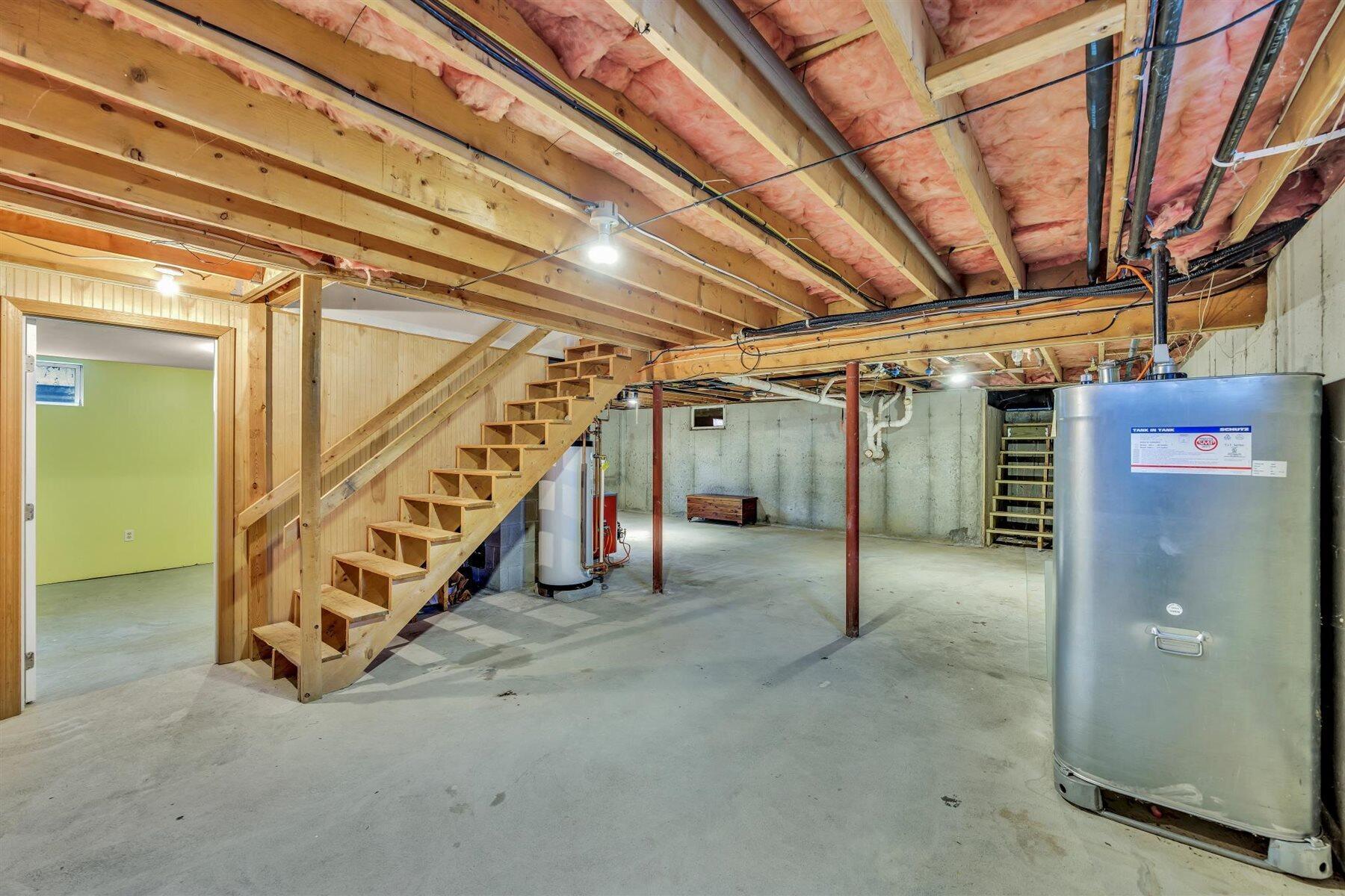 159 Old Chatham Road Brewster, MA 02631 - Photo 26 of 32 a view of an empty room with stairs