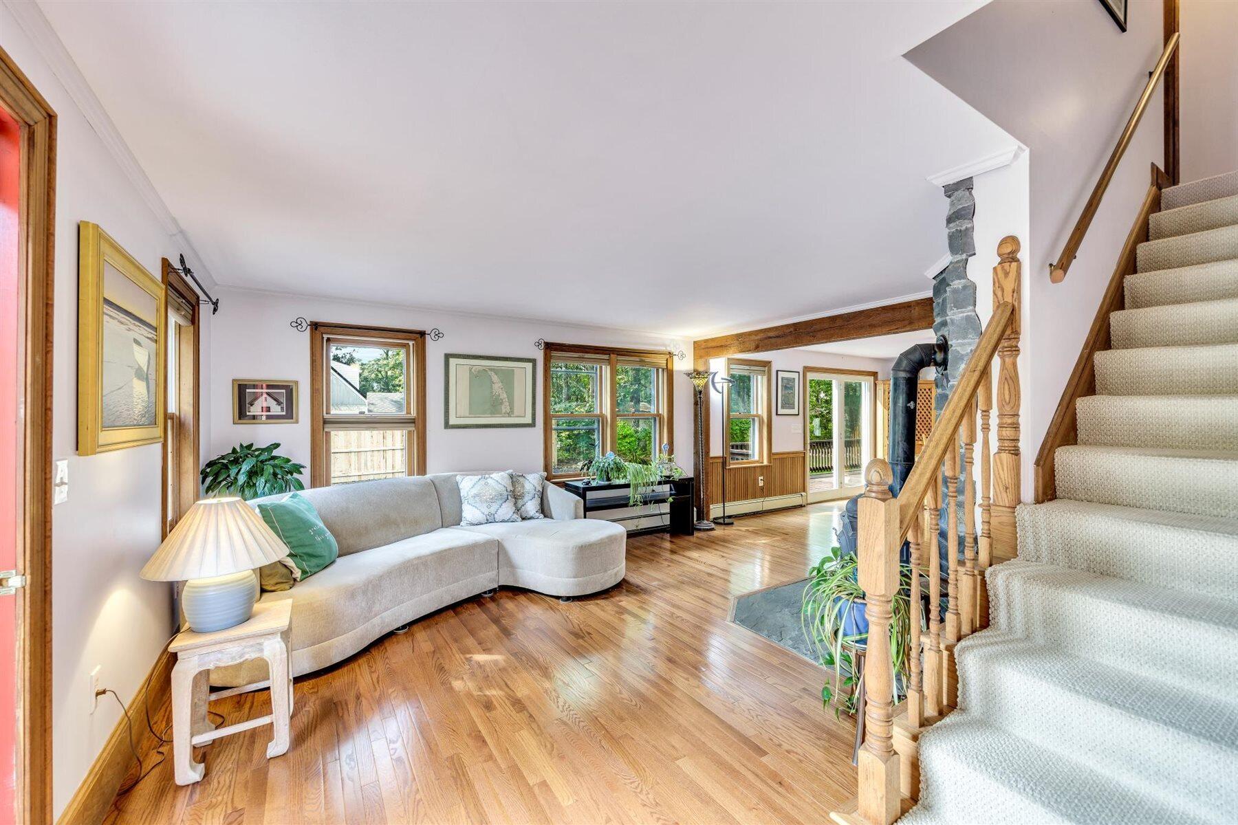 159 Old Chatham Road Brewster, MA 02631 - Photo 6 of 32 a living room with furniture and a large window