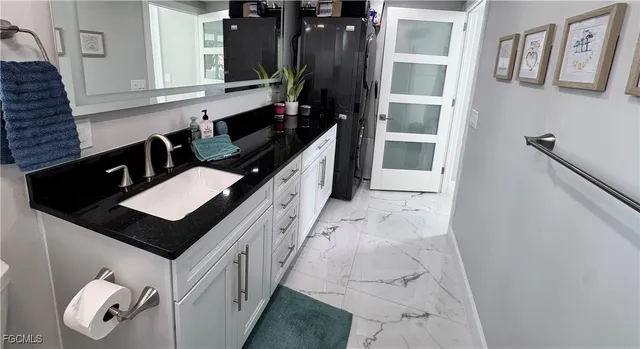 a hallway with cabinets