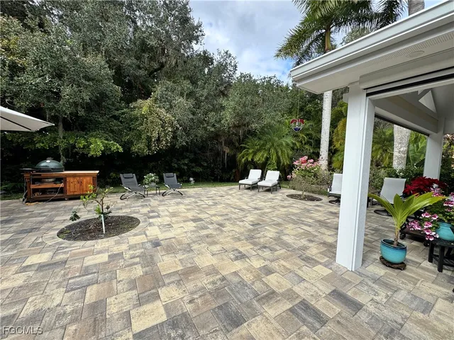 a view of a outdoor space with a patio
