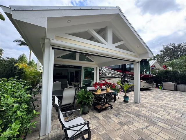 a view of a chairs in front of house