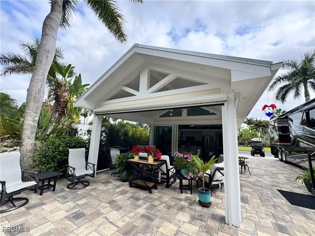a outdoor living space with furniture and potted plants