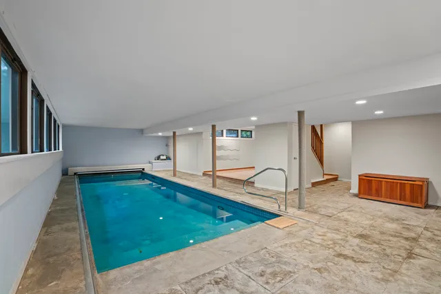 a house view with a seating space and garden