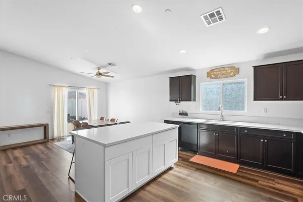 a kitchen with a sink and stove