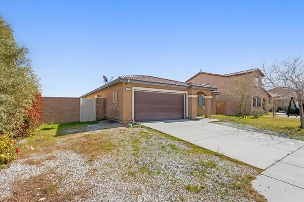 a house view with a outdoor space
