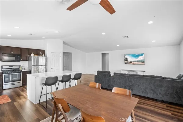a view of a dining room with furniture