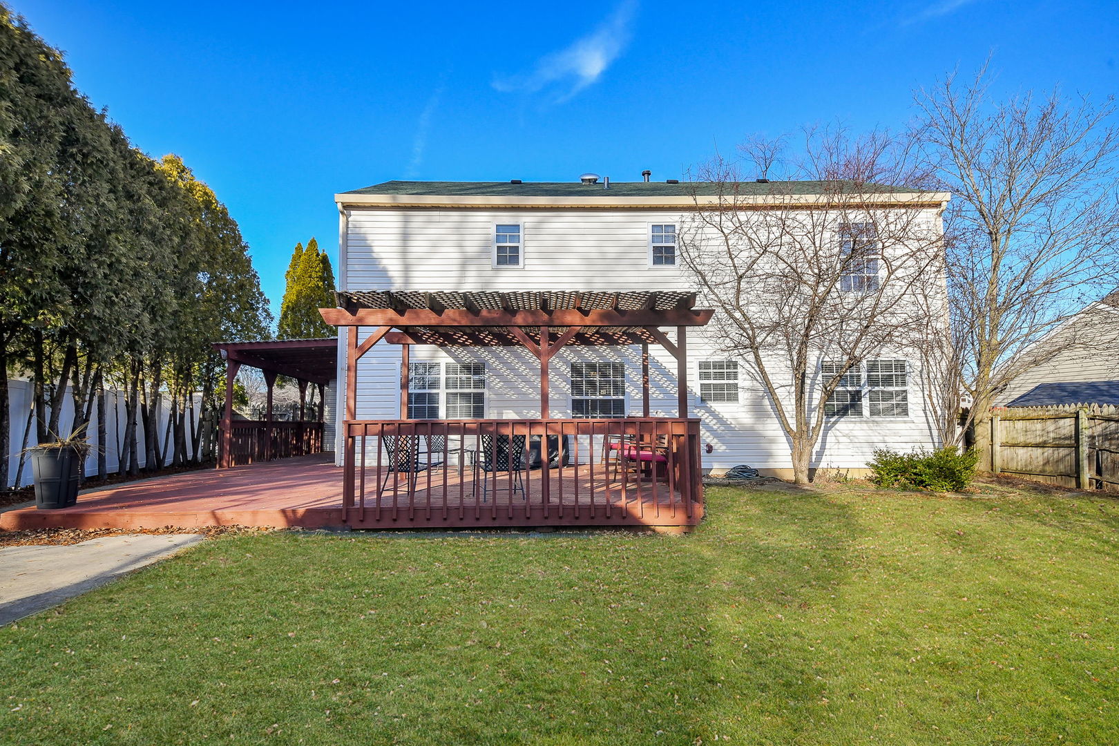 119 Canton Lane Streamwood, IL 60107 - Photo 22 of 28 a view of a house with a big yard and large tree
