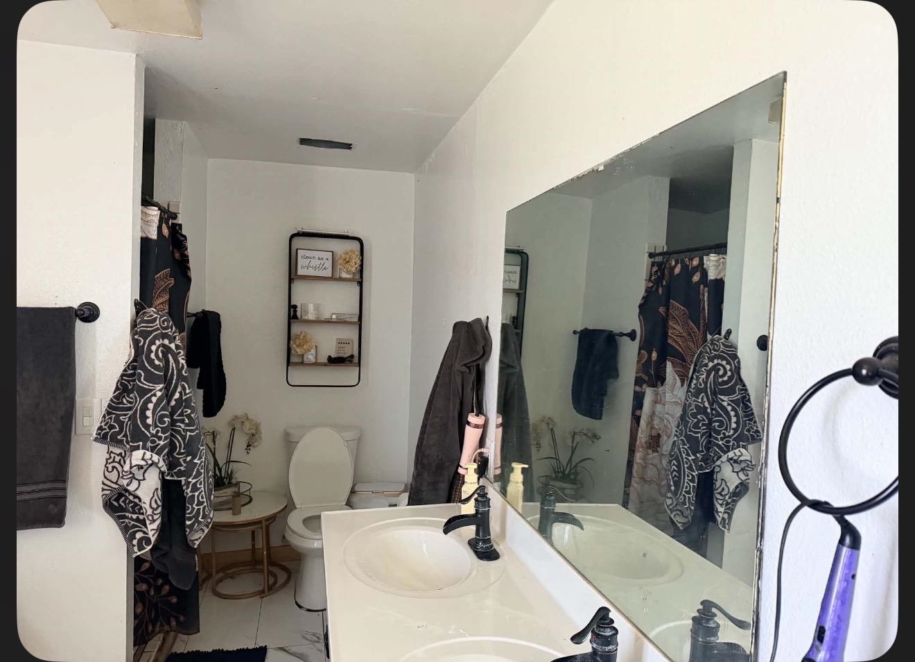 15440 Old Wagon Road Crescent Mills, CA 95934 - Photo 13 of 19 a bathroom with double vanity sink and a mirror