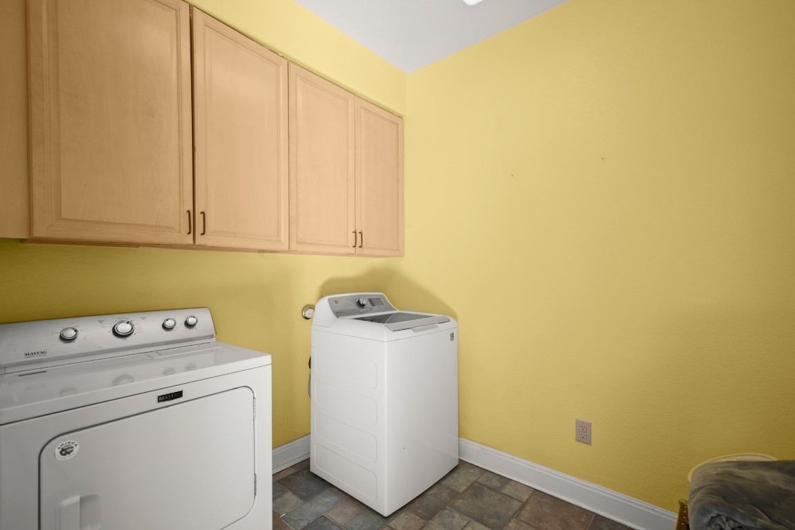 149 Spanish Oak Trail Elgin, TX 78621 - Photo 25 of 25 a utility room with dryer and washer