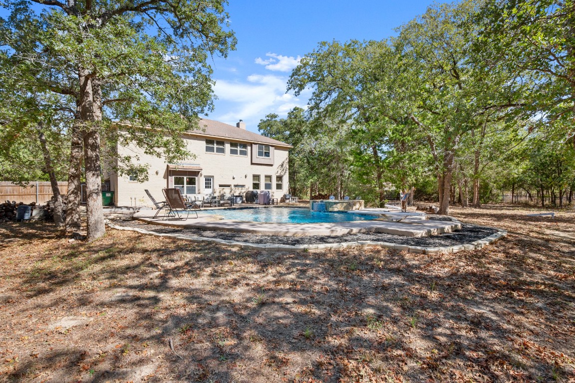 149 Spanish Oak Trail Elgin, TX 78621 - Photo 4 of 25 a view of a house with a yard