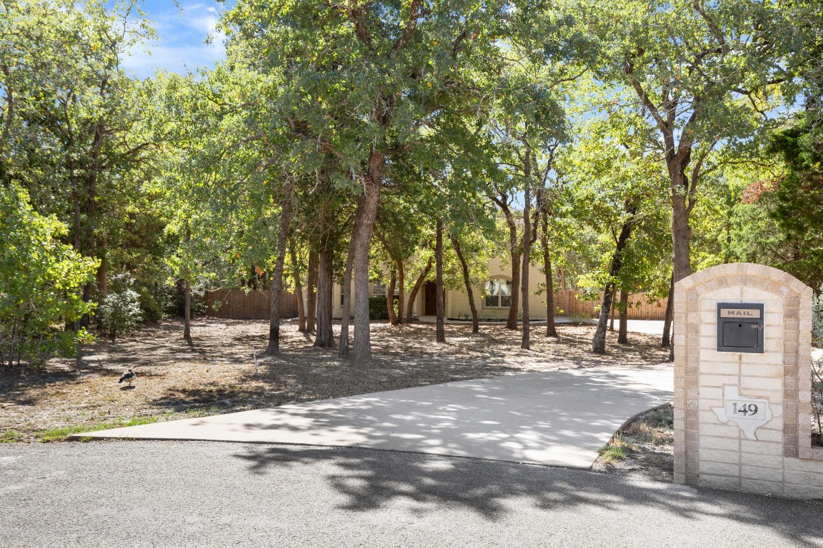 149 Spanish Oak Trail Elgin, TX 78621 - Photo 6 of 25 a view of a outdoor space with trees