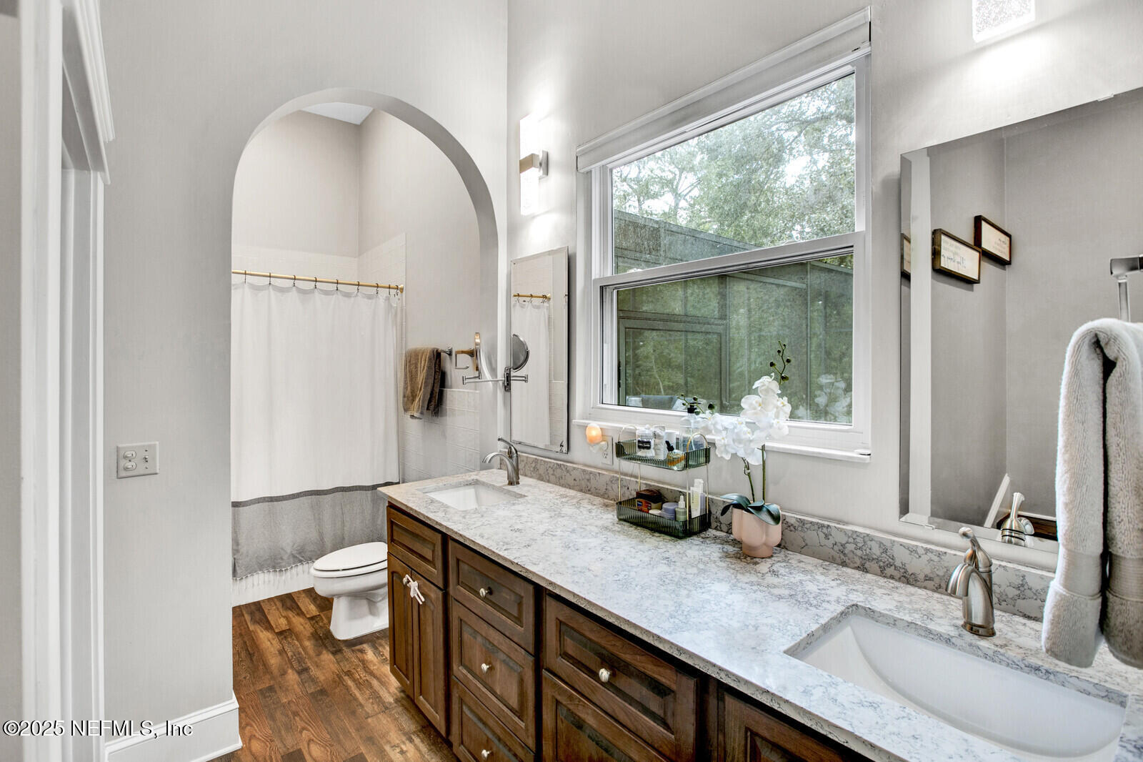 3565 Red Cloud Trail St. Augustine, FL 32086 - Photo 21 of 56 a bathroom with a granite countertop sink and a mirror