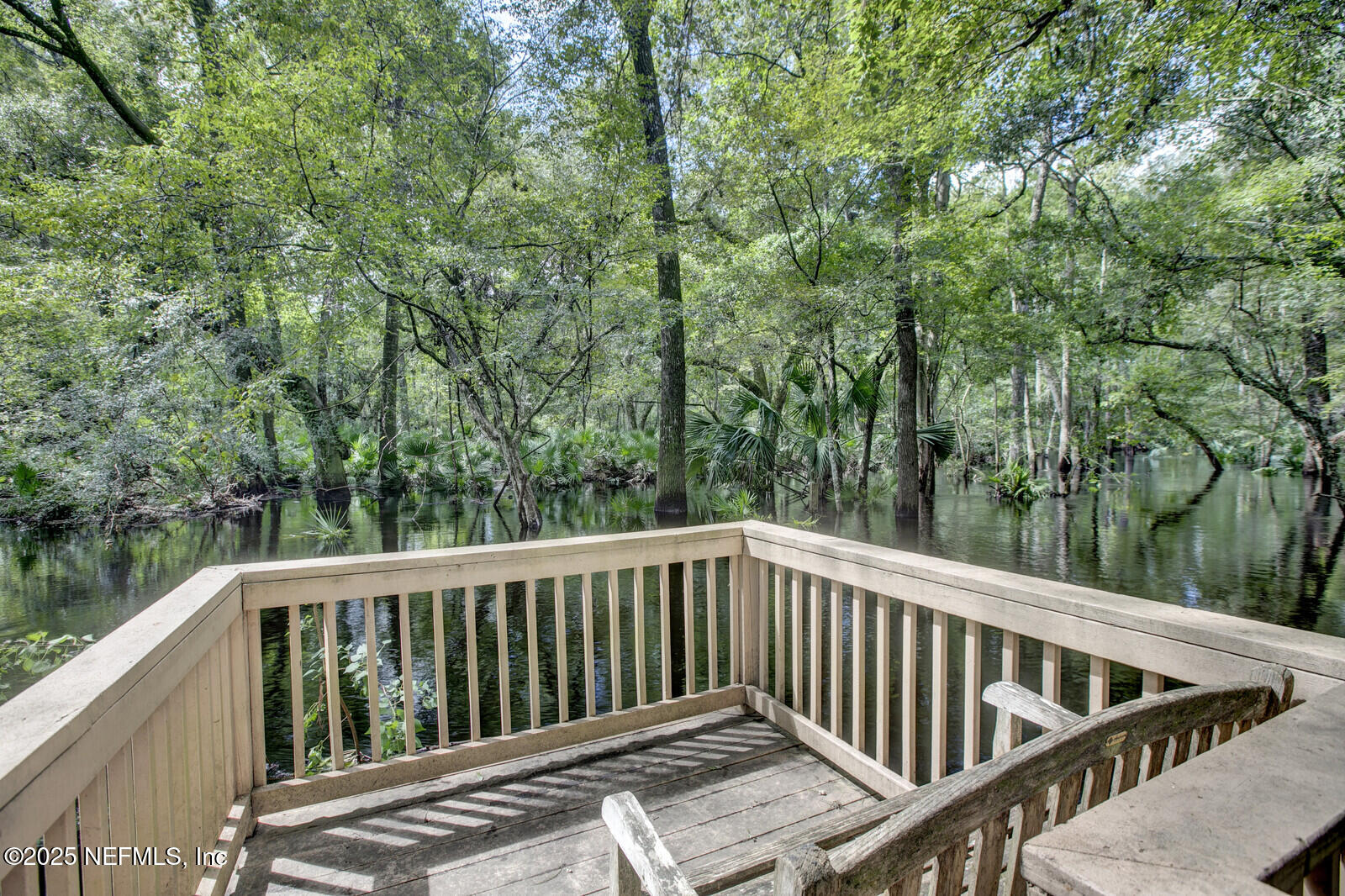 3565 Red Cloud Trail St. Augustine, FL 32086 - Photo 45 of 56 a view of a wooden deck with a trees