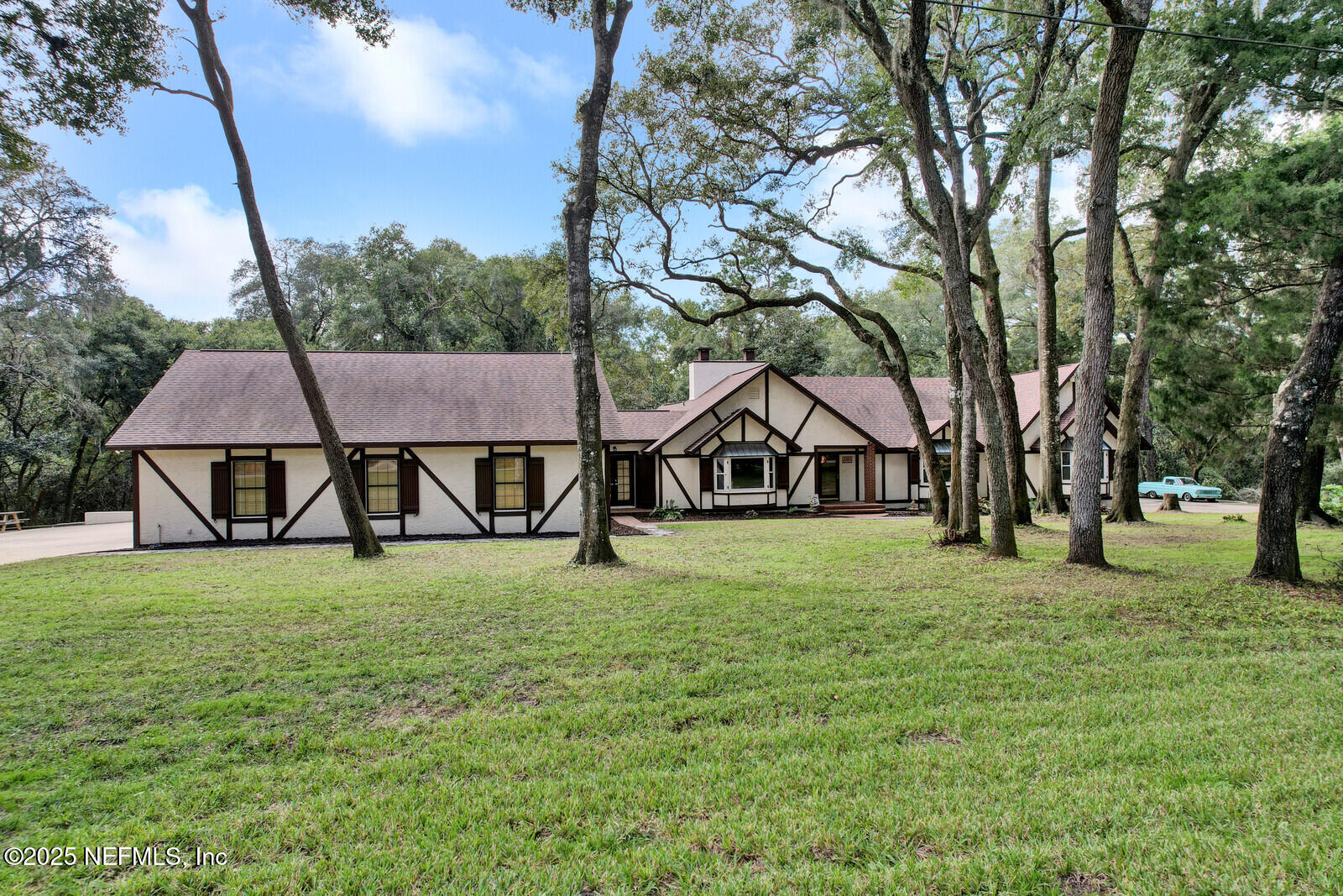 3565 Red Cloud Trail St. Augustine, FL 32086 - Photo 47 of 56 a house that has a tree in front of it