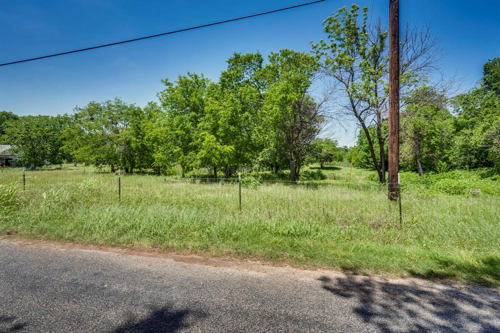 0 Old Telico Road Ennis, TX 75119 - Photo 11 of 13 a backyard of a house with lots of green space and outdoor seating