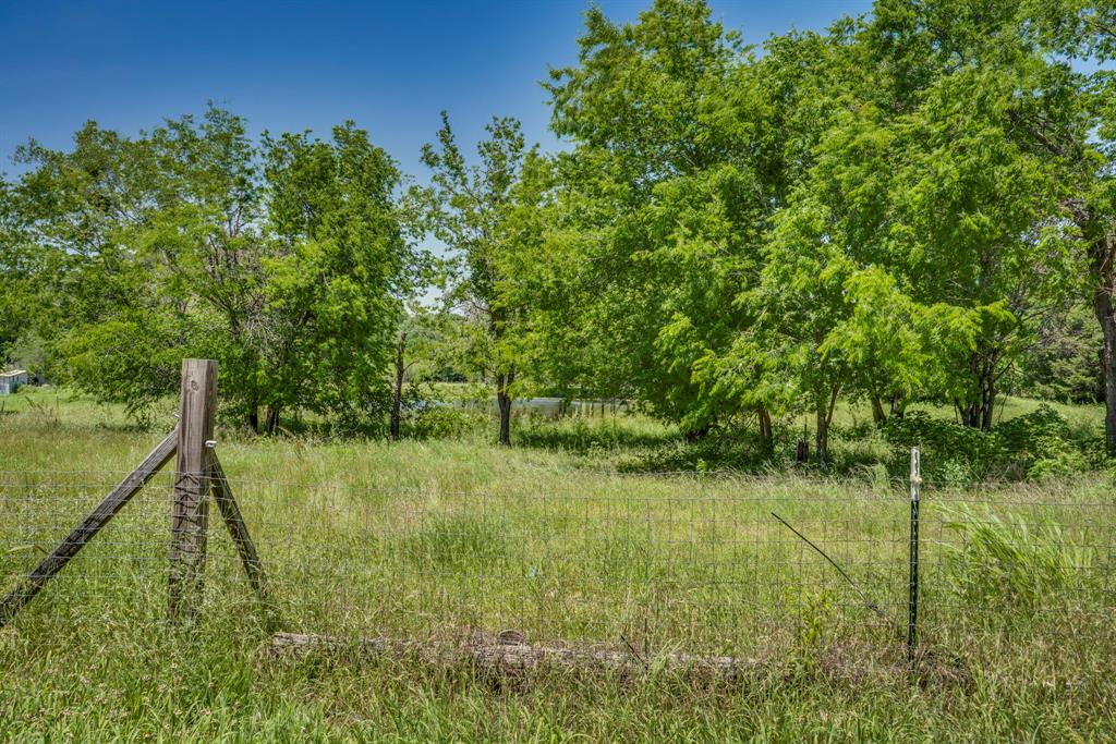 0 Old Telico Road Ennis, TX 75119 - Photo 9 of 13 a backyard of a house with lots of green space