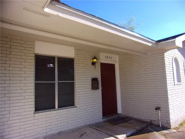 a view of a door and a window