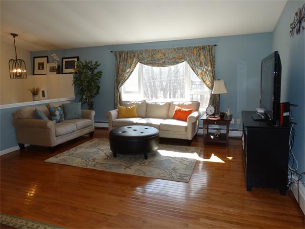 153 Cordaville Road Ashland, MA 01721 - Photo 3 of 24 a living room with furniture and a large window