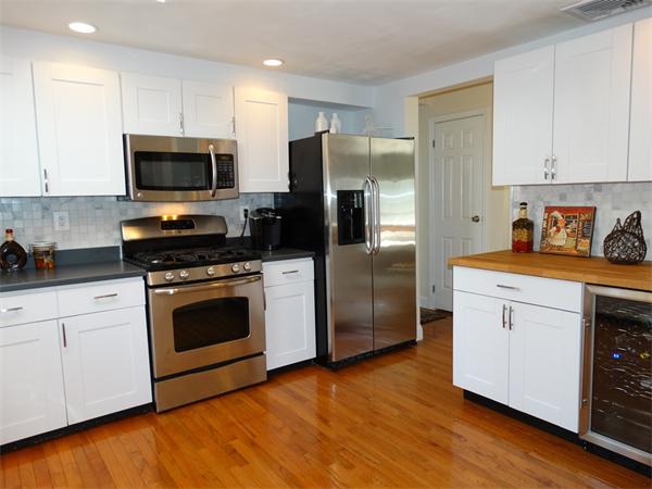 153 Cordaville Road Ashland, MA 01721 - Photo 8 of 24 a kitchen with stainless steel appliances a refrigerator microwave and sink