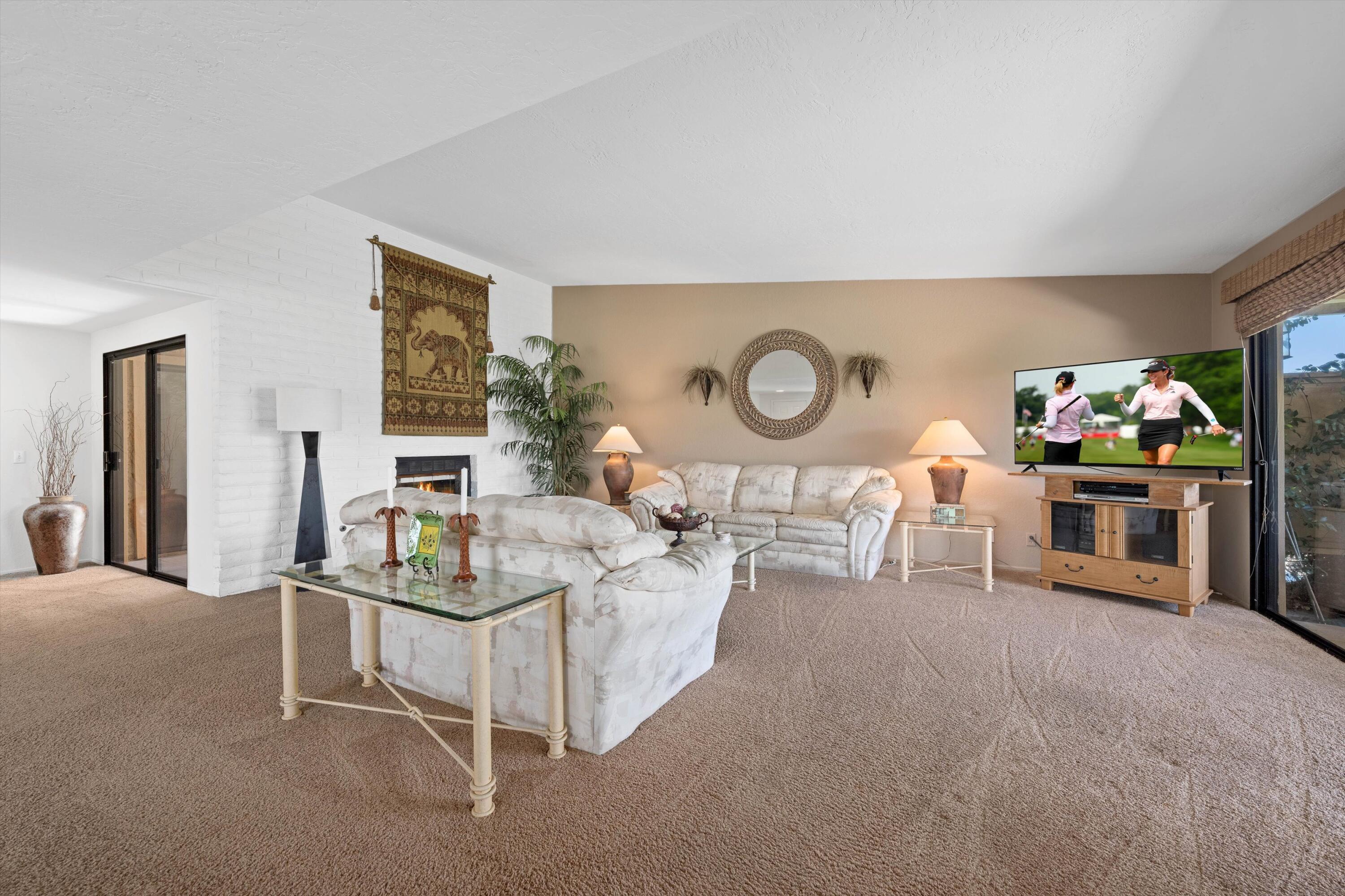 56 Maximo Way Palm Desert, CA 92260 - Photo 18 of 29 a living room with furniture and furniture