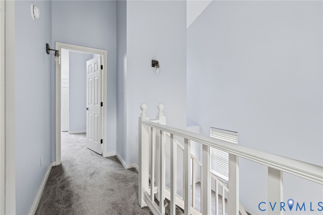 2655 Chancer Drive Henrico, VA 23233 - Photo 17 of 24 a view of a hallway with wooden floor and entryway