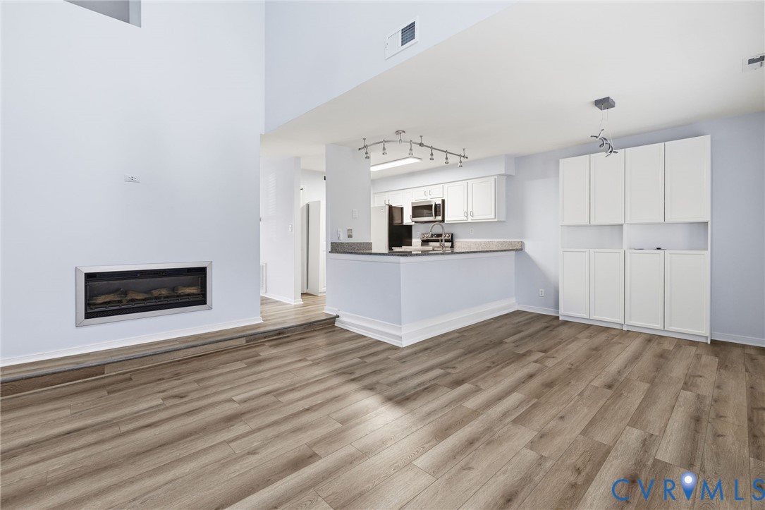 2655 Chancer Drive Henrico, VA 23233 - Photo 7 of 24 a view of a kitchen with wooden floor and a sink