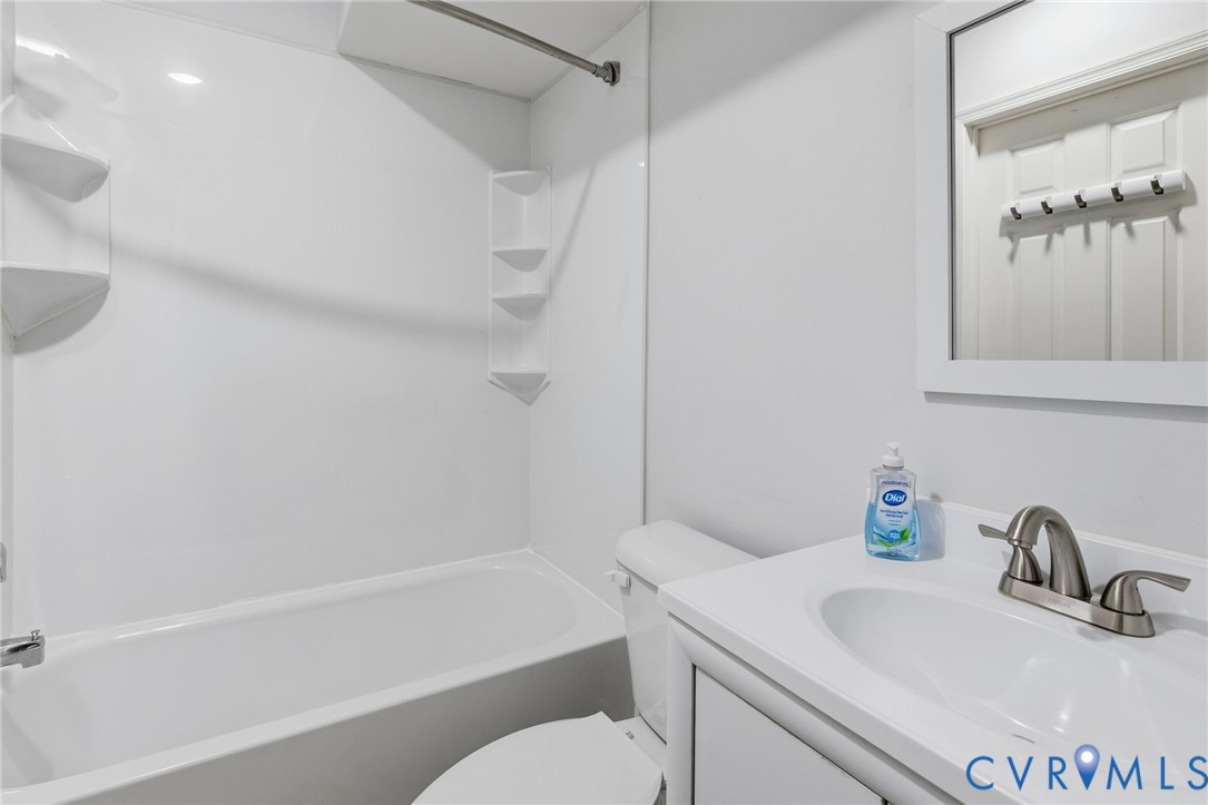 2655 Chancer Drive Henrico, VA 23233 - Photo 10 of 24 a bathroom with a sink toilet and shower