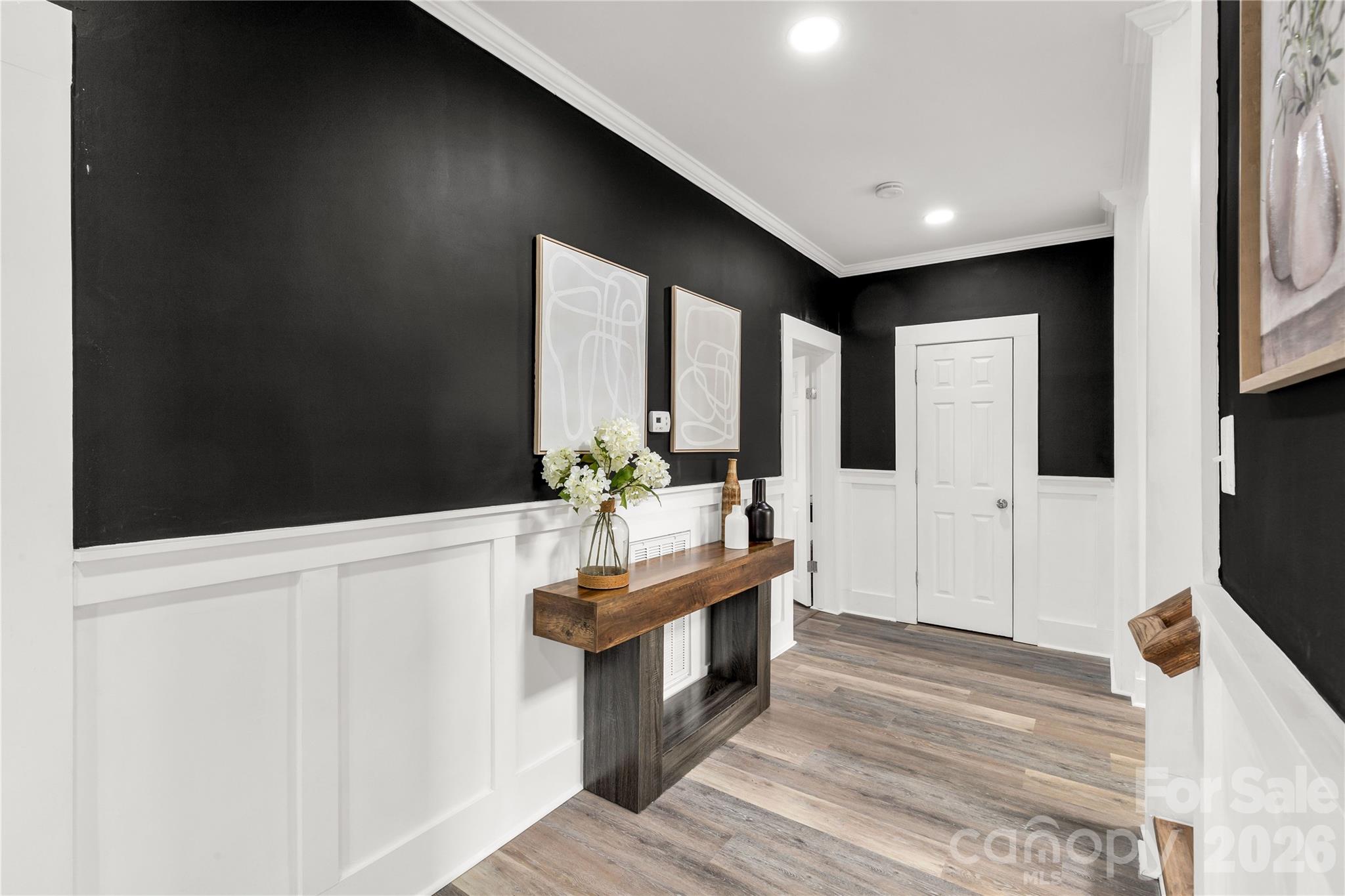 203 Jackson Street Fort Mill, SC 29715 - Photo 3 of 27 a spacious bathroom with a double vanity sink and a mirror