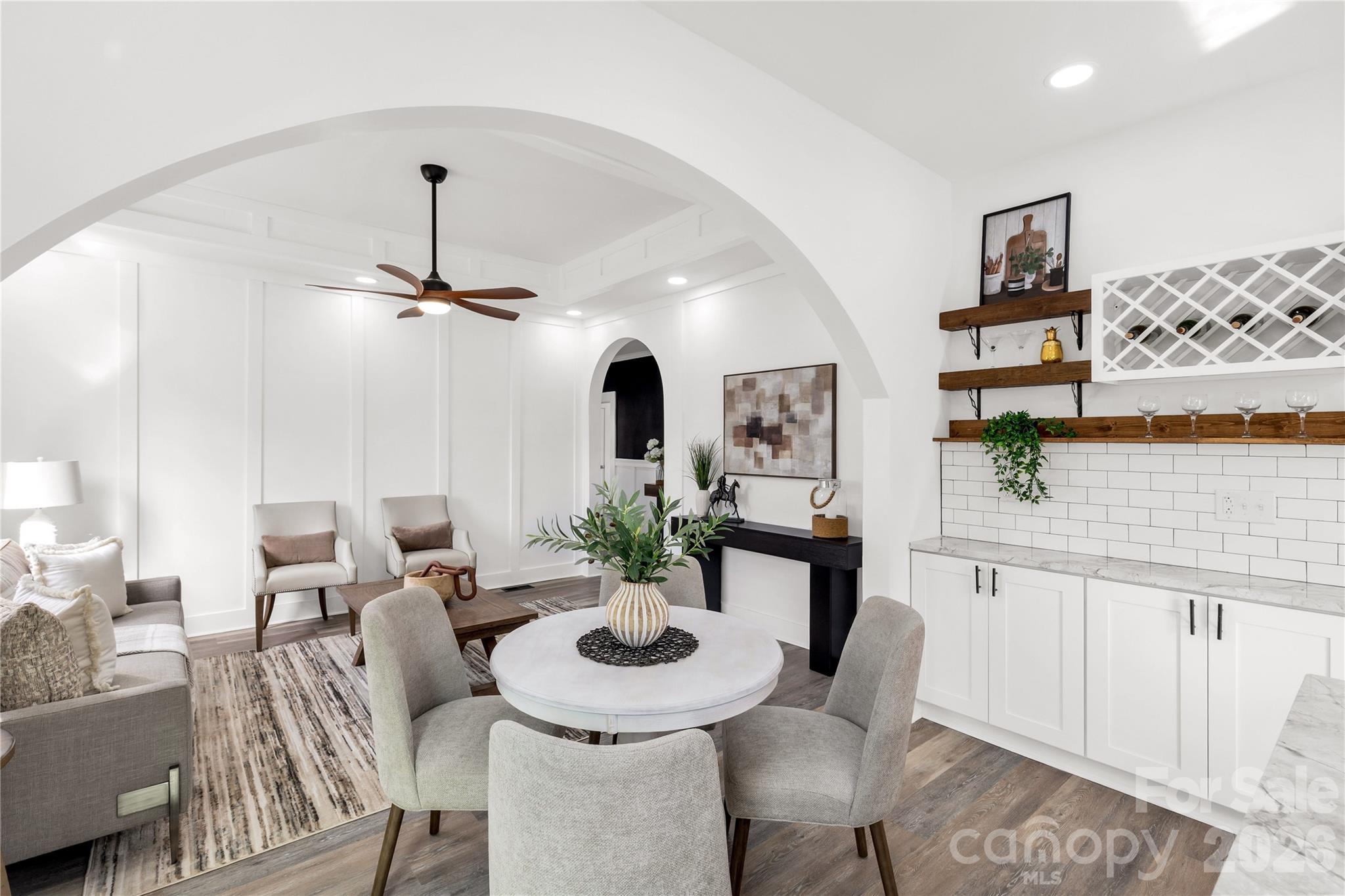 203 Jackson Street Fort Mill, SC 29715 - Photo 5 of 27 a view of a dining room with furniture and wooden floor