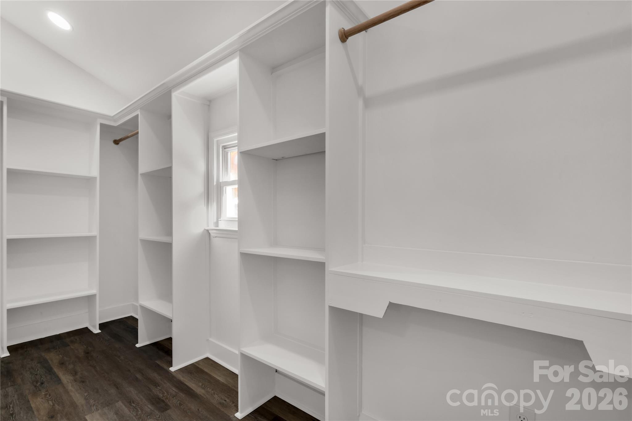203 Jackson Street Fort Mill, SC 29715 - Photo 8 of 27 a view of walk in closet with empty racks