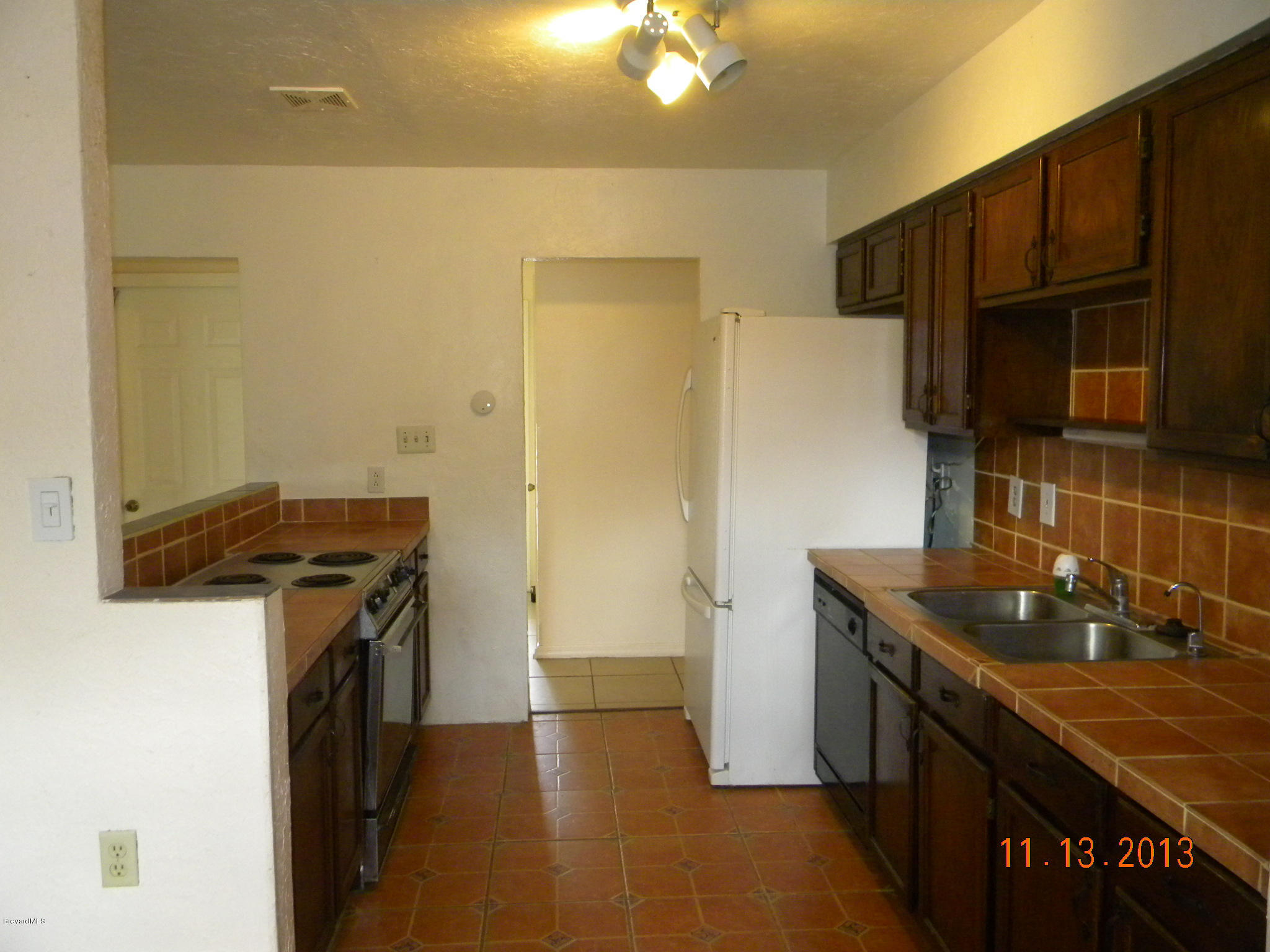 1120 Thompson Road Southwest Palm Bay, FL 32908 - Photo 2 of 14 Kitchen