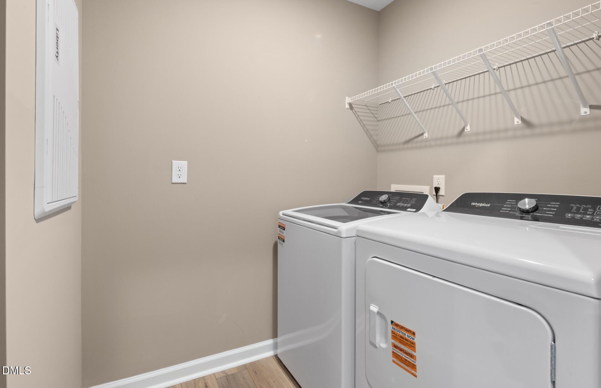 605 Timber Terrace Drive Durham, NC 27704 - Photo 15 of 31 a utility room with dryer and washer
