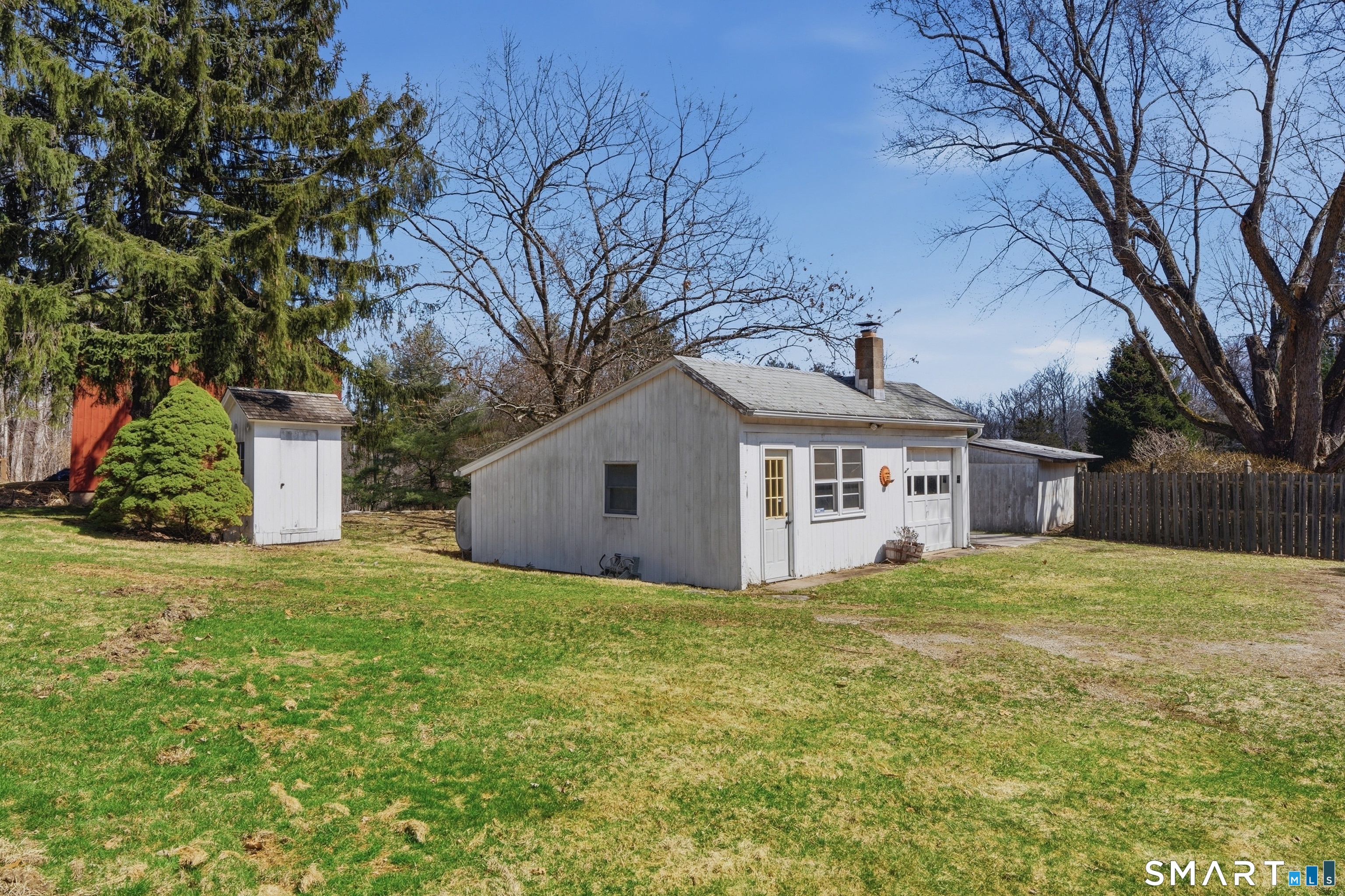 110 Freeman Road Middletown, CT 06457 - Photo 28 of 33 to the left is the outhouse - to the right is the detached heated garage with an office