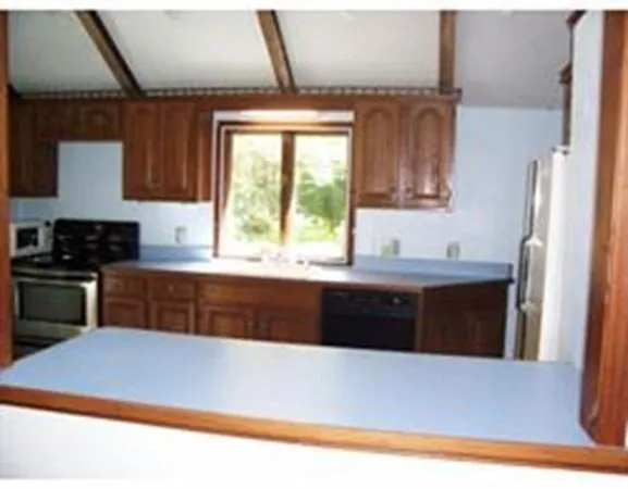 a living room with a fireplace