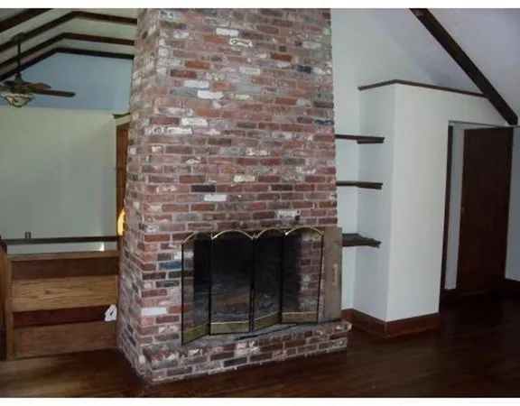 a view of a balcony with chairs