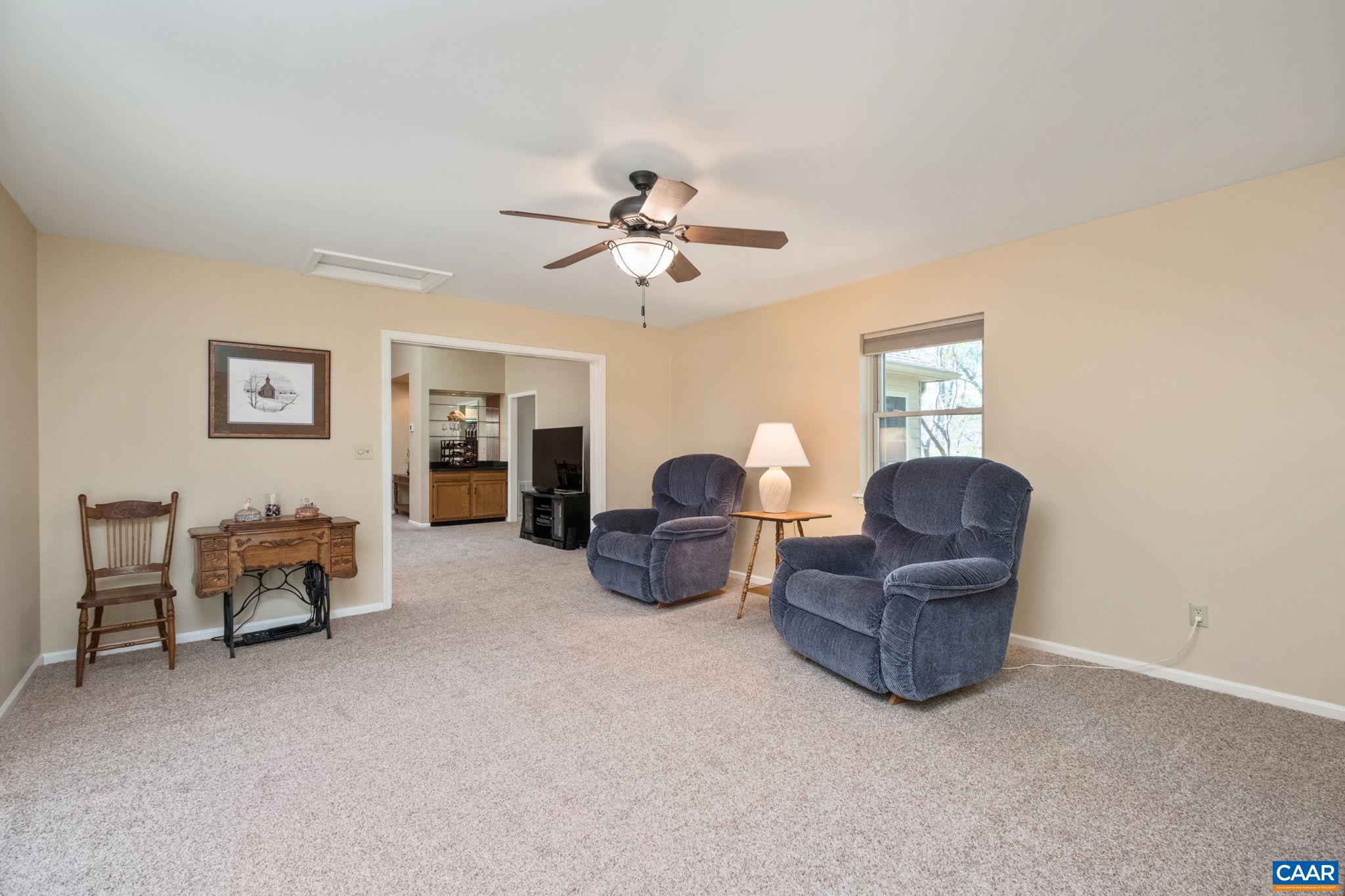 240 Homestead Lane Charlottesville, VA 22902 - Photo 14 of 32 a living room with furniture and a ceiling fan