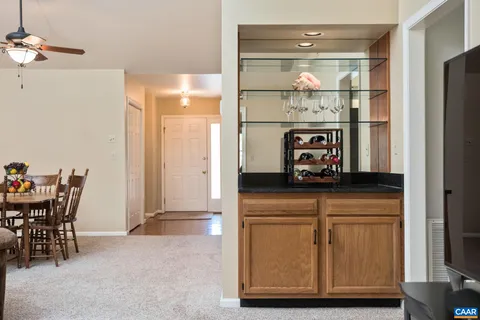a kitchen with table and chairs