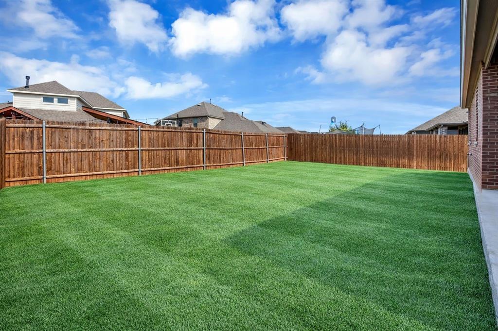 3106 Maverick Drive Forney, TX 75126 - Photo 24 of 32 a view of a backyard