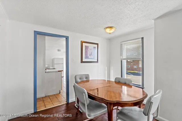 a kitchen with stainless steel appliances granite countertop a stove and a microwave